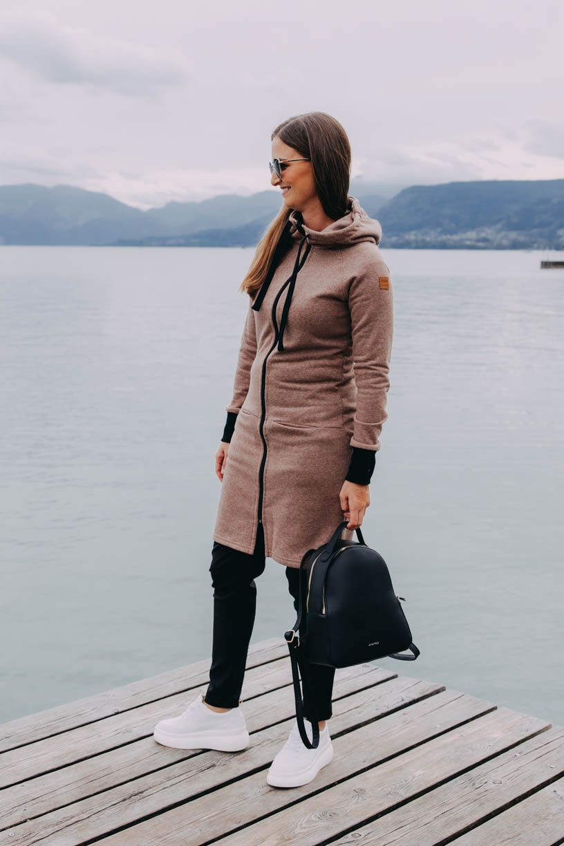 Dita má na sobě při své výšce 180 cm velikost M.