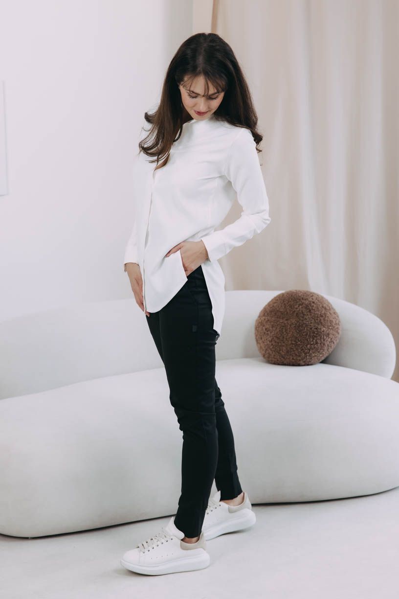 Káťa má na sobě při své výšce 170 cm velikost XS.