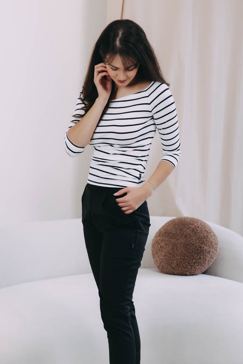 Káťa má na sobě při své výšce 170 cm velikost XS.