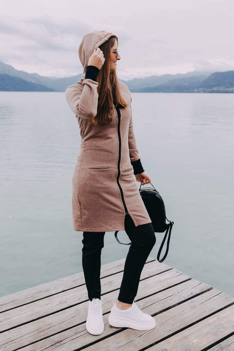 Dita má na sobě při své výšce 180 cm velikost M.