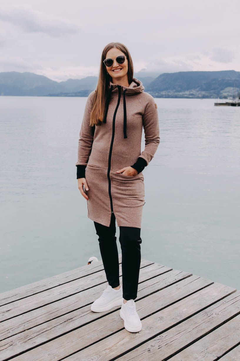 Dita má na sobě při své výšce 180 cm velikost M.