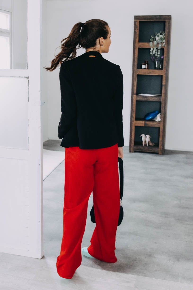 Káťa má na sobě při své výšce 170 cm velikost XS.