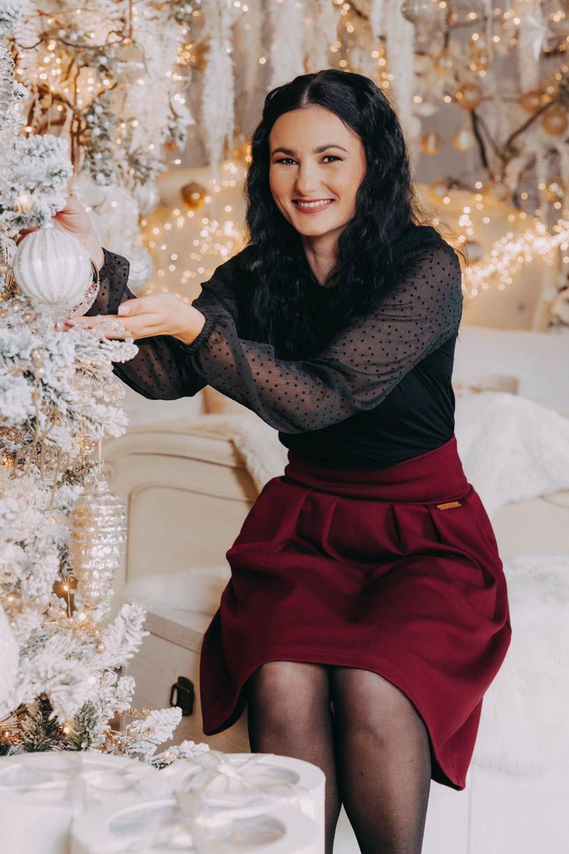 Monča má na sobě při své výšce 160 cm velikost XS.