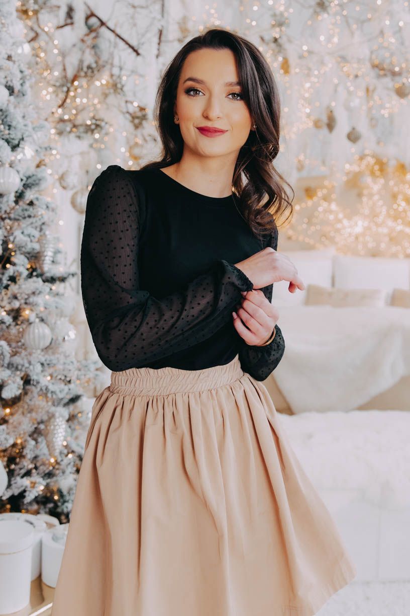 Kačka má na sobě při své výšce 170 cm velikost XS.