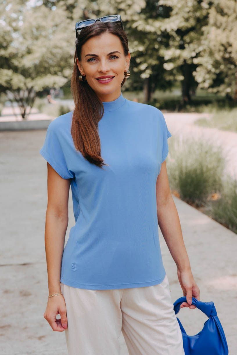 Zuzka má na sobě při své výšce 168 cm velikost XS.