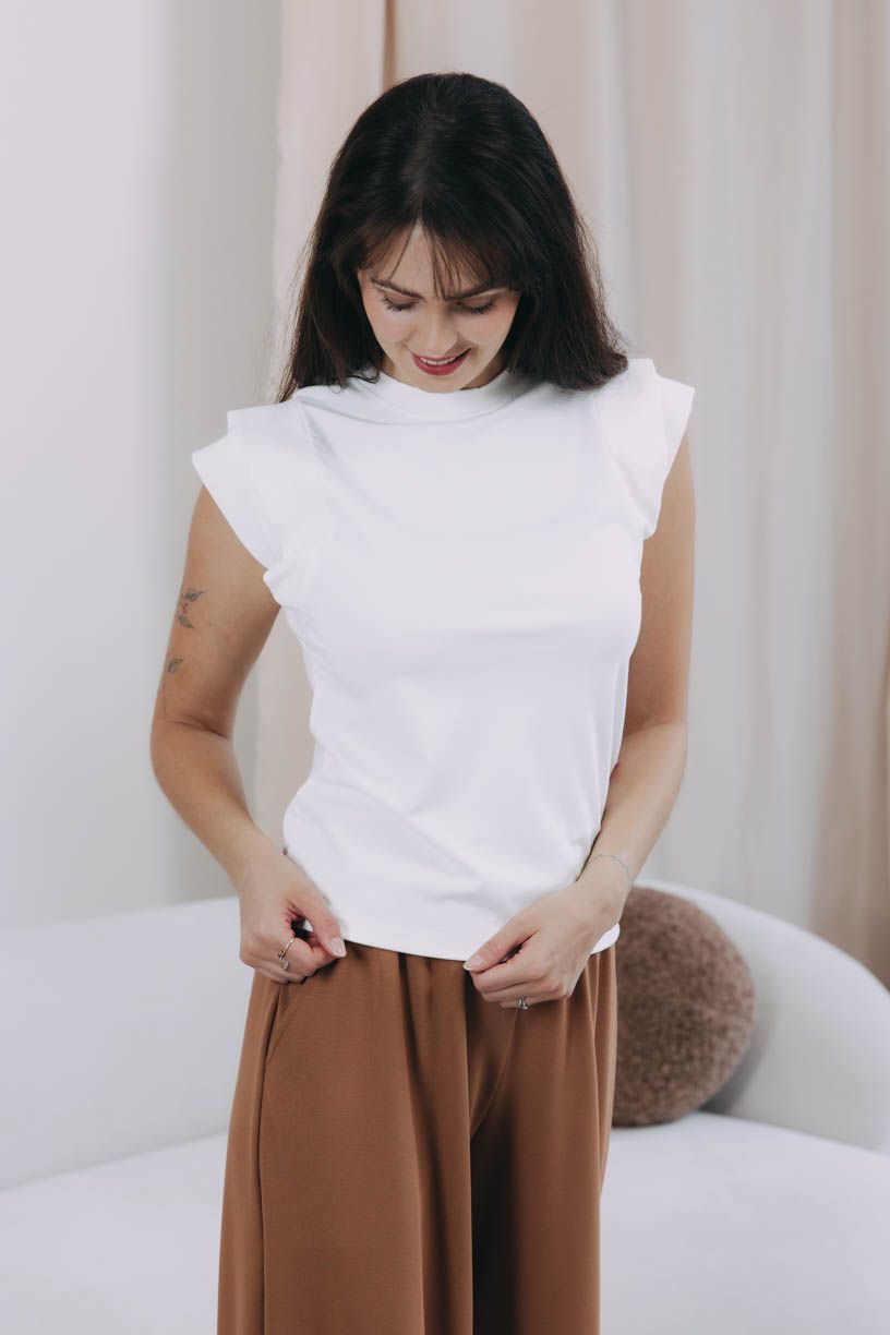 Káťa má na sobě při své výšce 170 cm velikost XS.