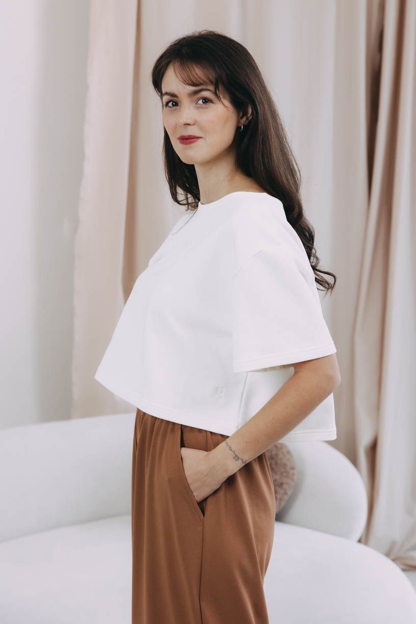 Káťa má na sobě při své výšce 170 cm velikost XS/S.