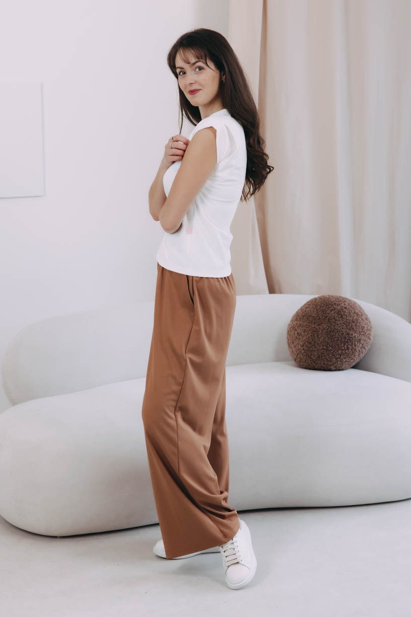 Káťa má na sobě při své výšce 170 cm velikost XS.