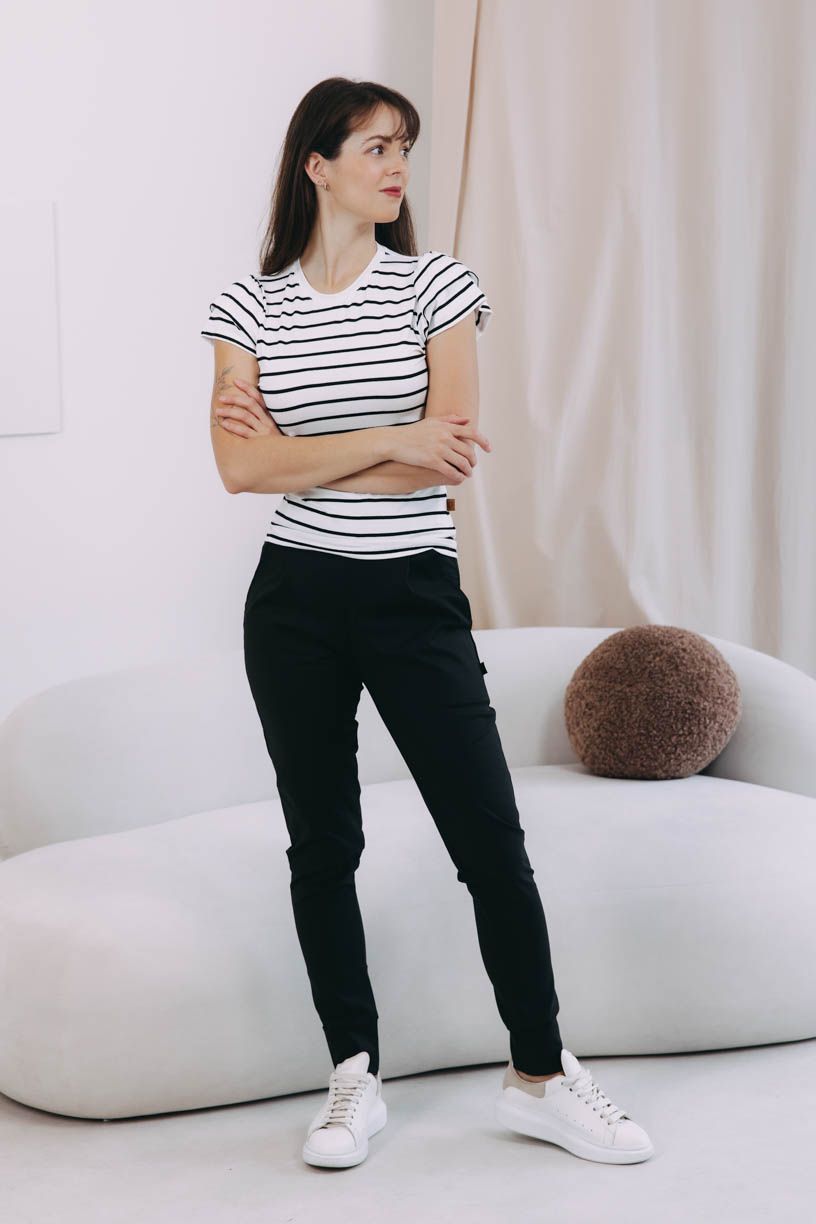 Káťa má na sebe pri svojej výške 170 cm veľkosť XS.