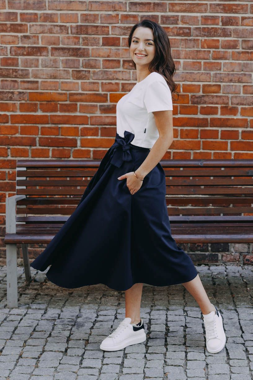 Kačka má na sobě při své výšce 170 cm velikost XS.