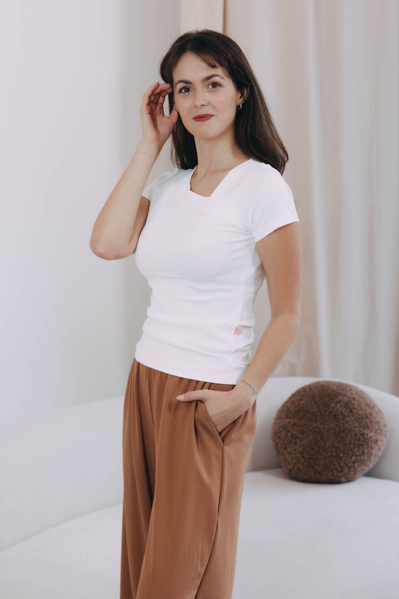 Káťa má na sobě při své výšce 170 cm velikost XS.